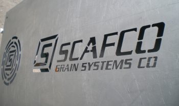 SCAFCO Grain Systems logo cutout on steel surface